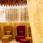 Latini_Gold_Spa A round room covered with curtains.