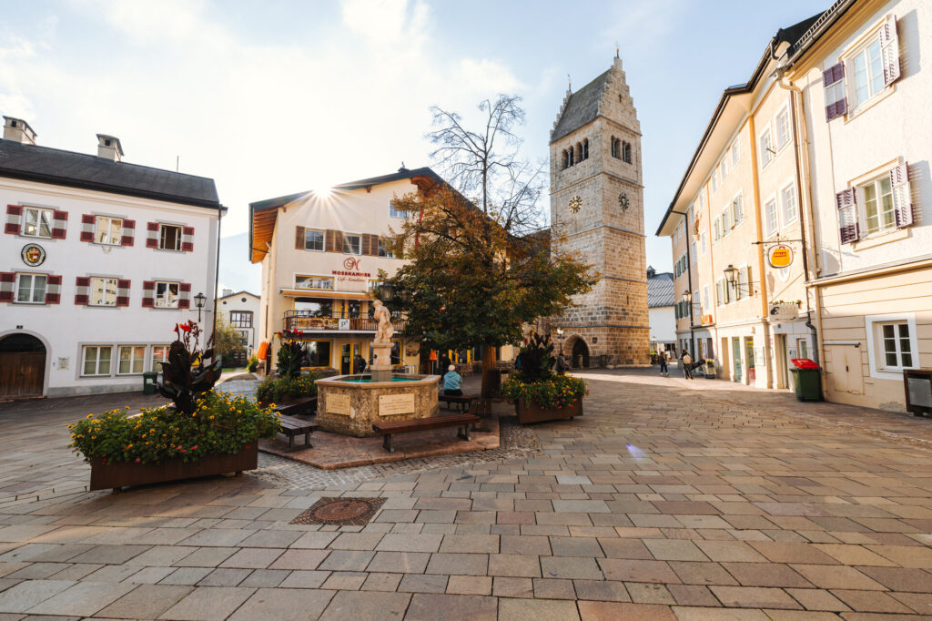 Town square in Zell am See with the tower of St. Hippolyt Parish Church